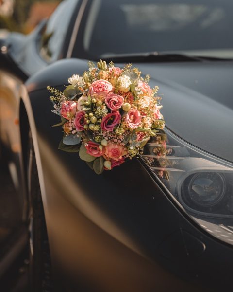 a bouquet of flowers on a car