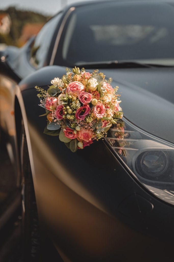 a bouquet of flowers on a car