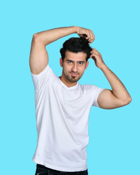 a person with the hands in the air